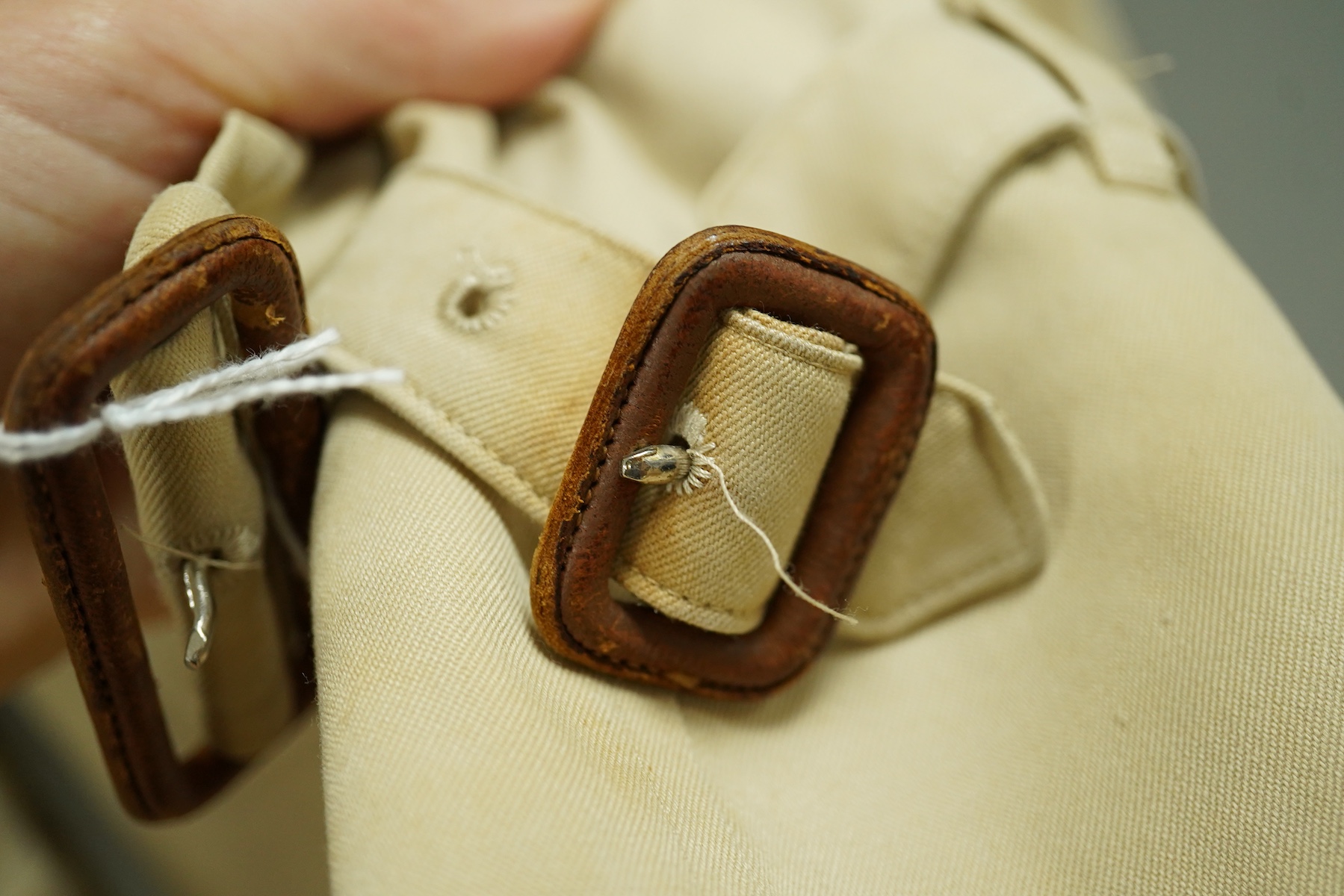 A ladies Burberry mac with check lining and belt, size 16 Long